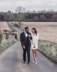 Custom wedding dress jacket with 'To the Moon and Back' motif