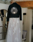 Bridal leather cover-up with celestial elements, perfect for the bride who wants to shine like the sun and the moon