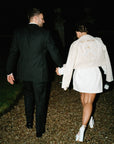 Custom bride leather jacket in ivory with Zodiac embroidery and Skeleton Couple Pinky Promise – a stylish and whimsical cover-up for a memorable wedding look