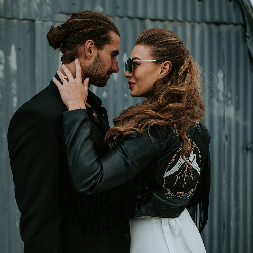 Bride's Western gothic leather jacket with celestial details – a custom Till Death embroidered cover-up, adding a touch of uniqueness to your wedding ensemble