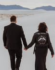Till Death embroidered bride leather jacket – a striking and gothic-inspired cover-up for a unique and celestial-themed wedding ensemble
