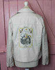 Custom bride jacket with intricate Skeleton Couple motif, perfect for weddings