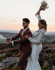 Ivory Embroidered Rebel Bride Jacket: Express your individuality with this unique 'Ride or Die' bridal cover-up, combining edgy style with the elegance of ivory embroidery