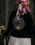 Black leather bridal jacket featuring 'My Sun, My Moon & All My Stars' – a poetic touch for an elegant wedding look