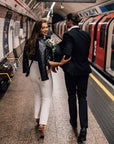 Black leather bridal jacket featuring custom zodiac embroidery – a stylish and contemporary choice for brides looking for a distinctive wedding cover-up