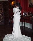 Enchanting Ivory Wedding Jacket: The 'Till Death' bridal cover-up in ecru is a celestial masterpiece, with intricate embroidery that adds a touch of magic to your wedding ensemble