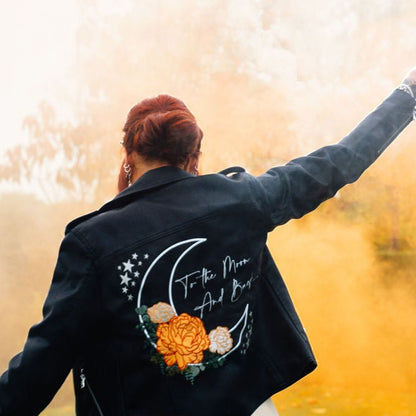 Floral Moon To The Moon & Back Bride Black Leather Bridal Jacket – a romantic and celestial-inspired cover-up for a dreamy wedding