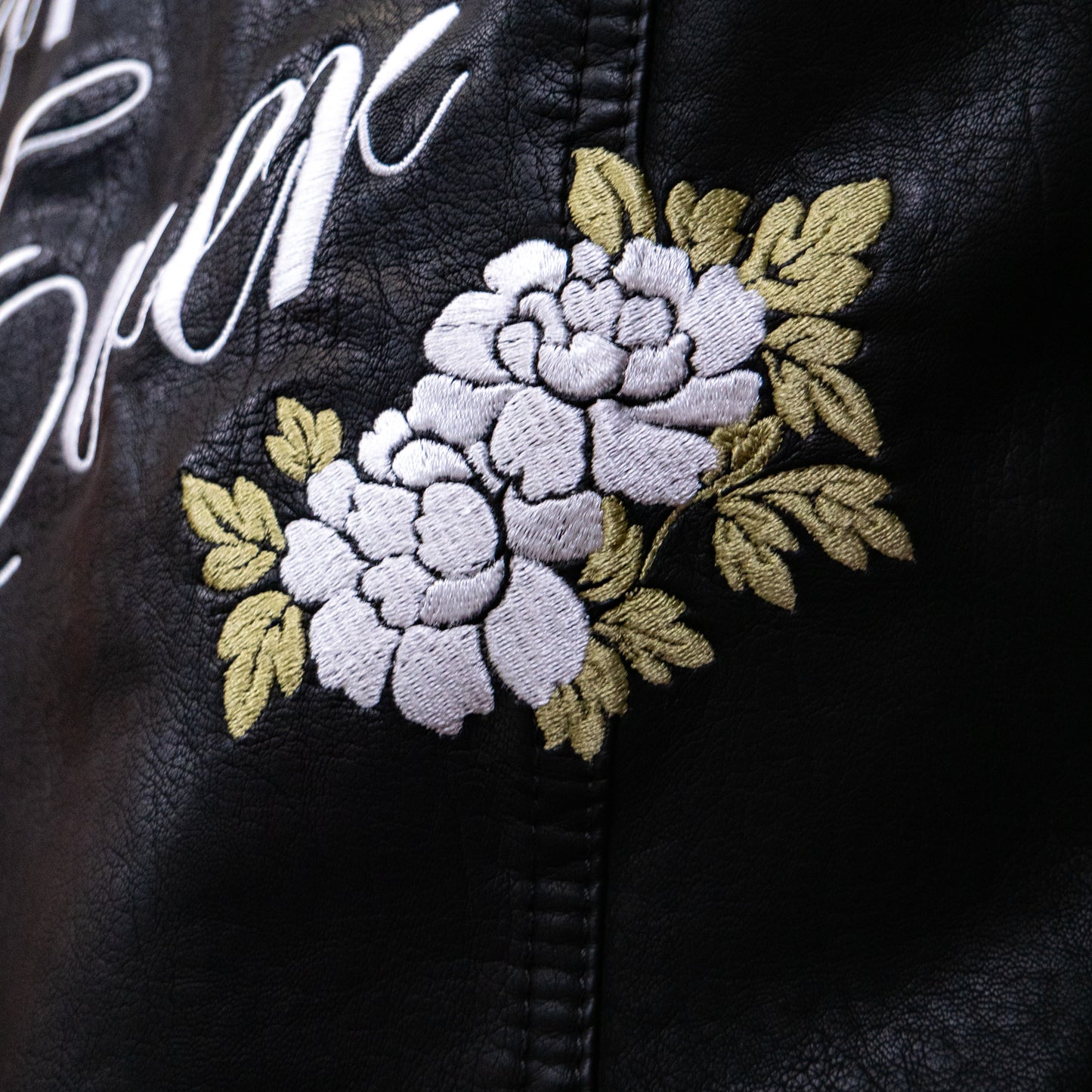 Bridal jacket with Motto charm – a perfect blend of simplicity and style for the bride seeking understated elegance
