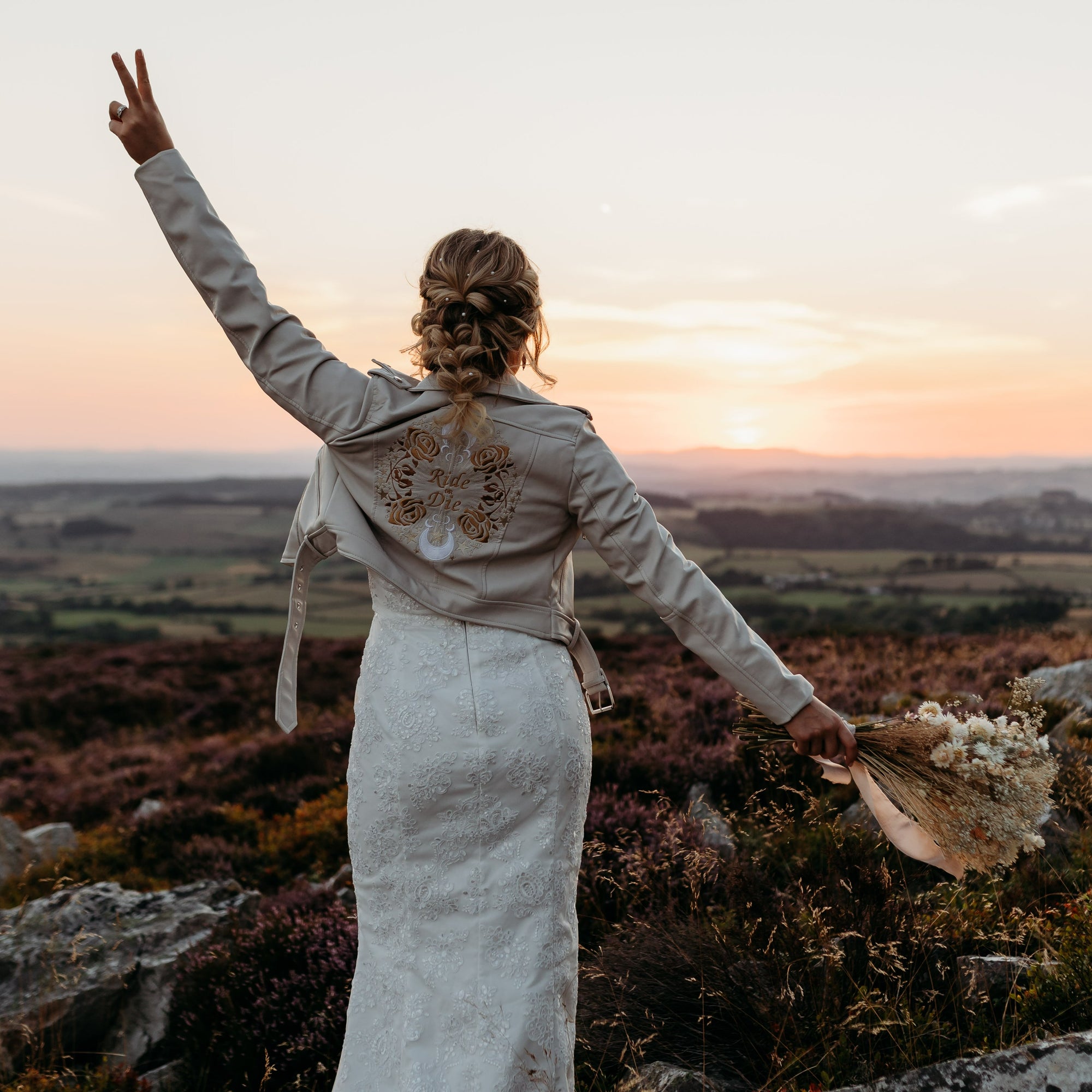 Edgy Ivory Embroidered Bridal Jacket: Elevate your wedding look with this 'Ride or Die' cover-up, featuring unique embroidery that adds a touch of rebellious charm to your ensemble