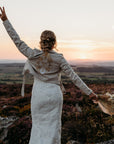 Edgy Ivory Embroidered Bridal Jacket: Elevate your wedding look with this 'Ride or Die' cover-up, featuring unique embroidery that adds a touch of rebellious charm to your ensemble