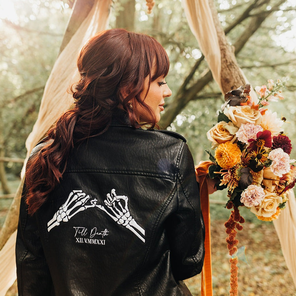 Till Death Pinky Promise Black Leather Bridal Jacket – a stylish and romantic cover-up for a bold wedding look