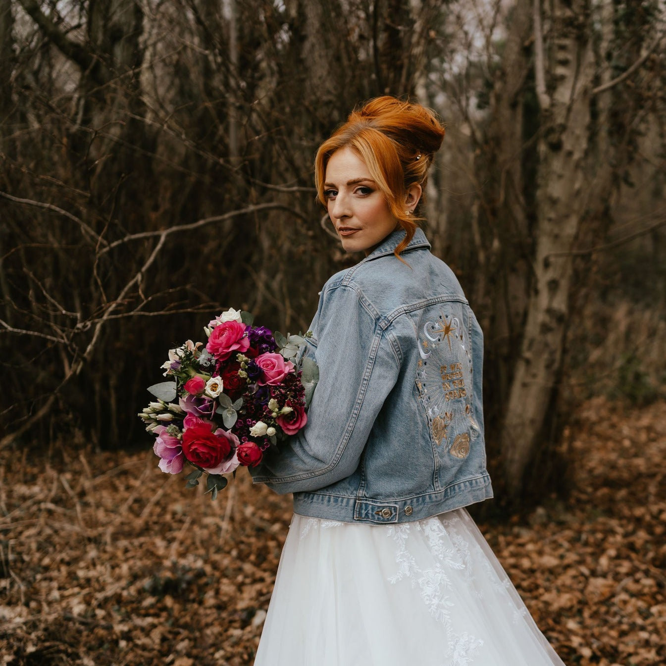 Ecru Embroidered Written in the Stars Jacket: Elevate your bridal ensemble with this denim cover-up, adorned with intricate embroidery that captures the enchanting beauty of a starlit night