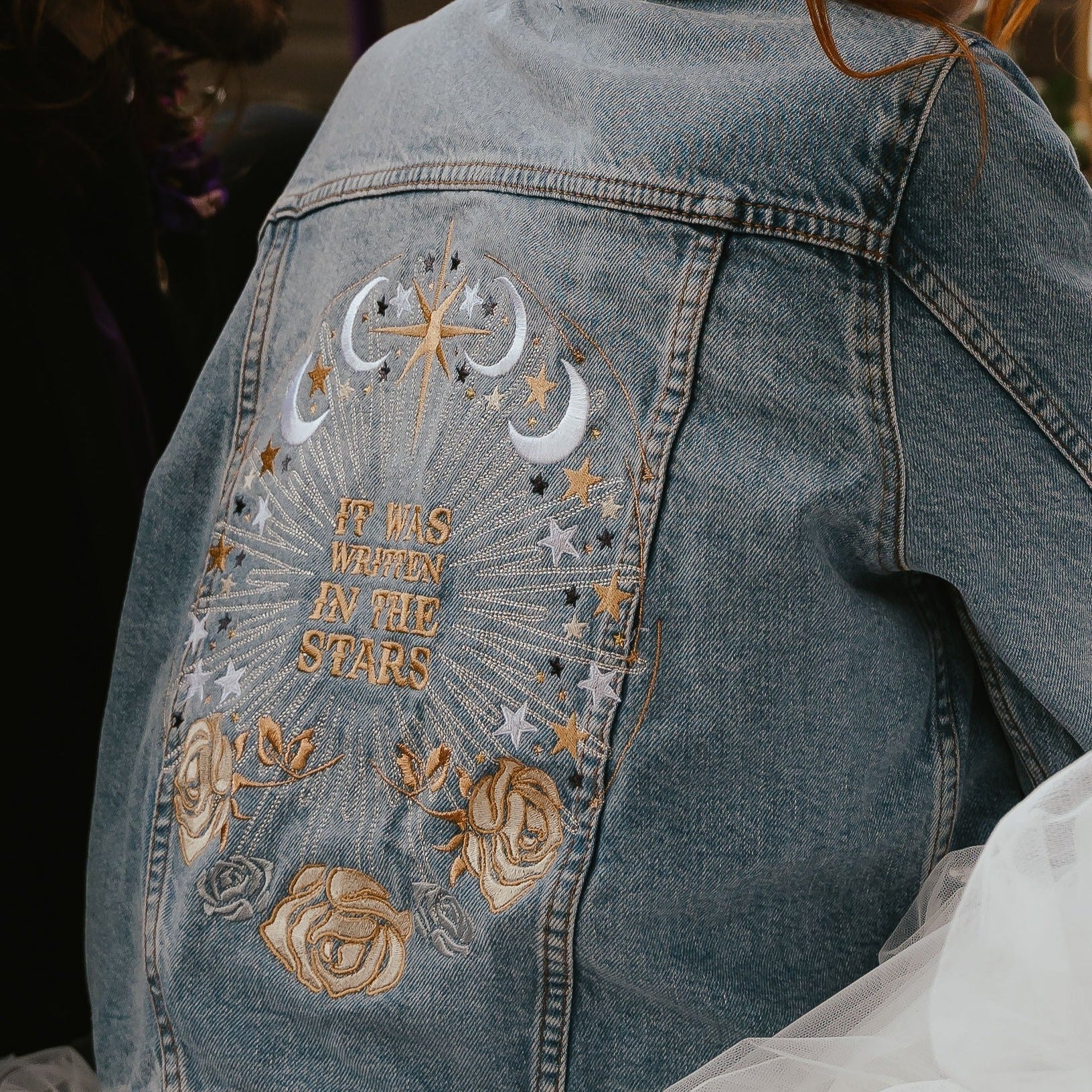 Chic Starry Night Denim Jacket: Make a celestial statement on your wedding day with this stylish cover-up, showcasing a starry night design in ecru embroidery on classic denim