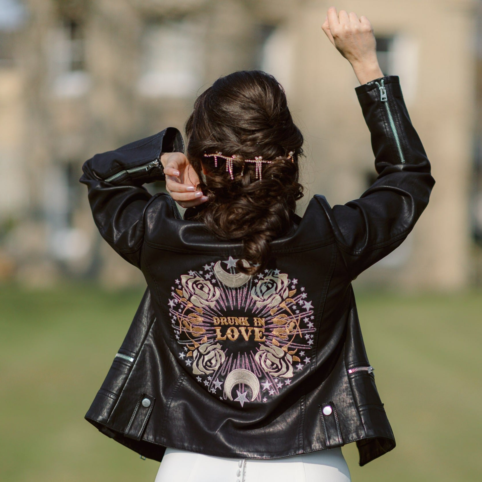 Black leather jacket for the bride who's 'Drunk in Love' – a trendy and expressive wedding cover-up