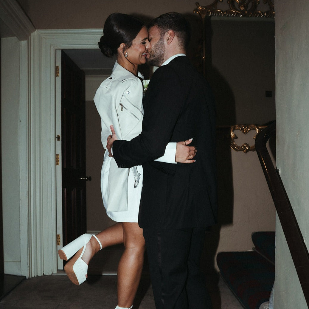 Ivory leather jacket adorned with celestial embroidery perfecty for a celestial-themed wedding