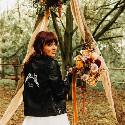 Black leather bridal jacket featuring 'Till Death - Pinky Promise' – a chic and symbolic cover-up for the modern bride