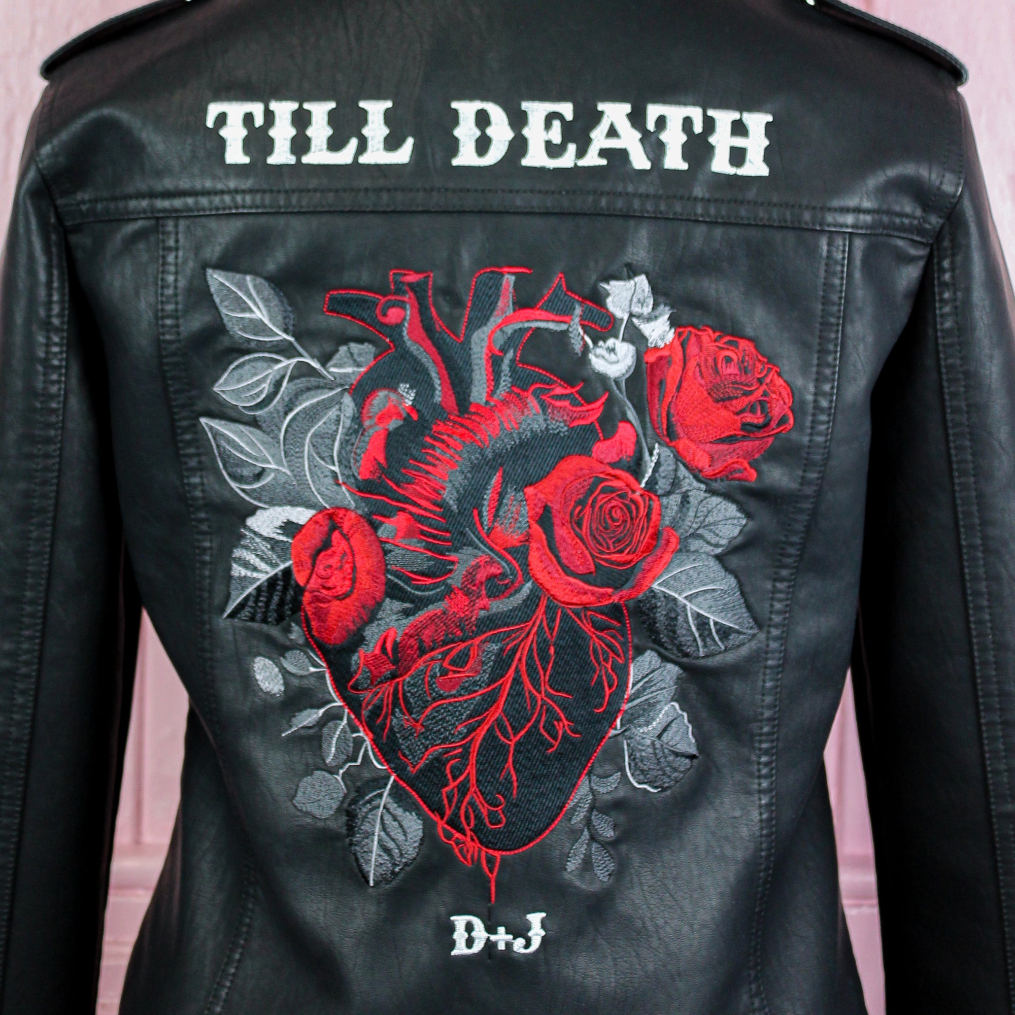 Black biker jacket for brides, perfect for a rock n roll wedding