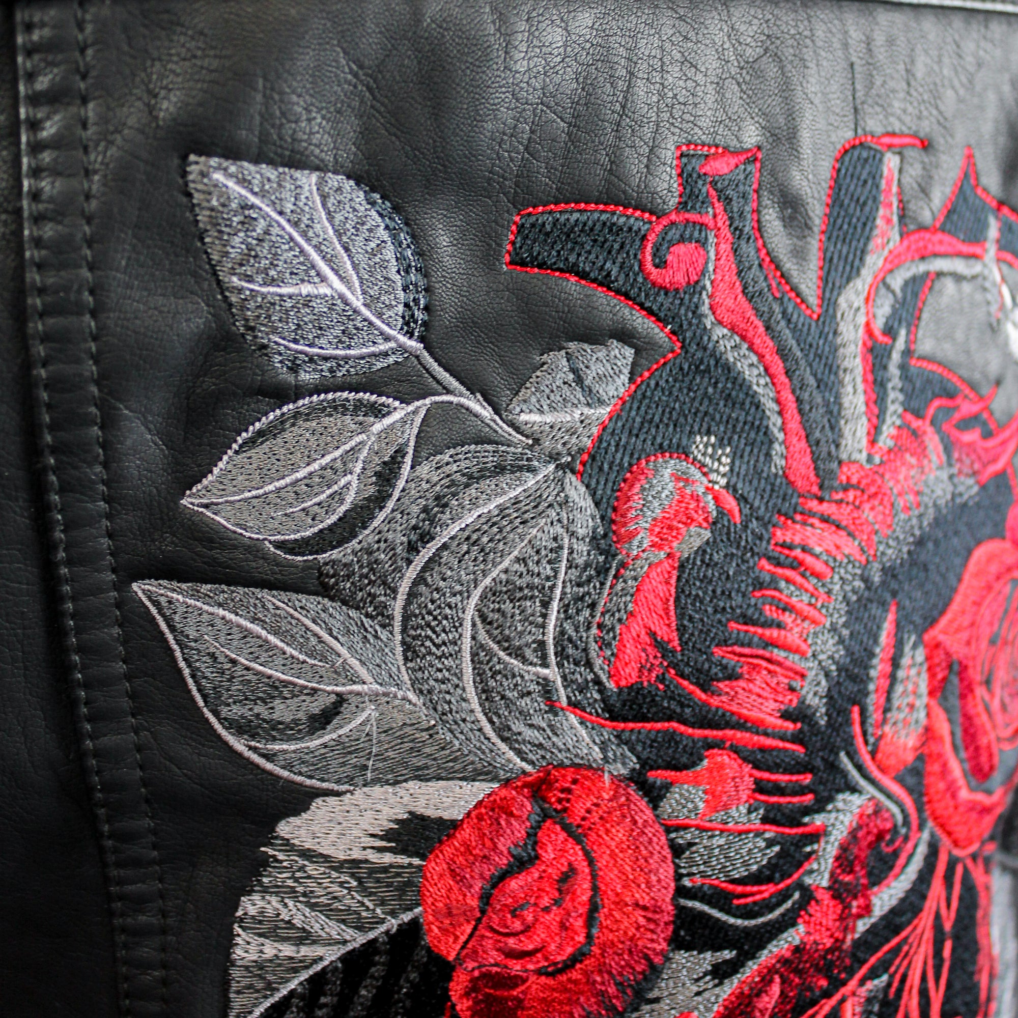 Rock n roll wedding attire: Anatomical heart black biker jacket