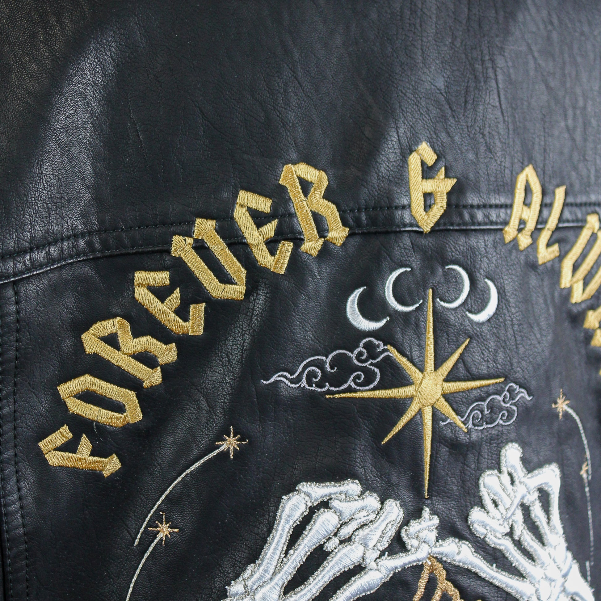 Forever & Always Celestial Bride's custom leather jacket for a bold and distinctive wedding look