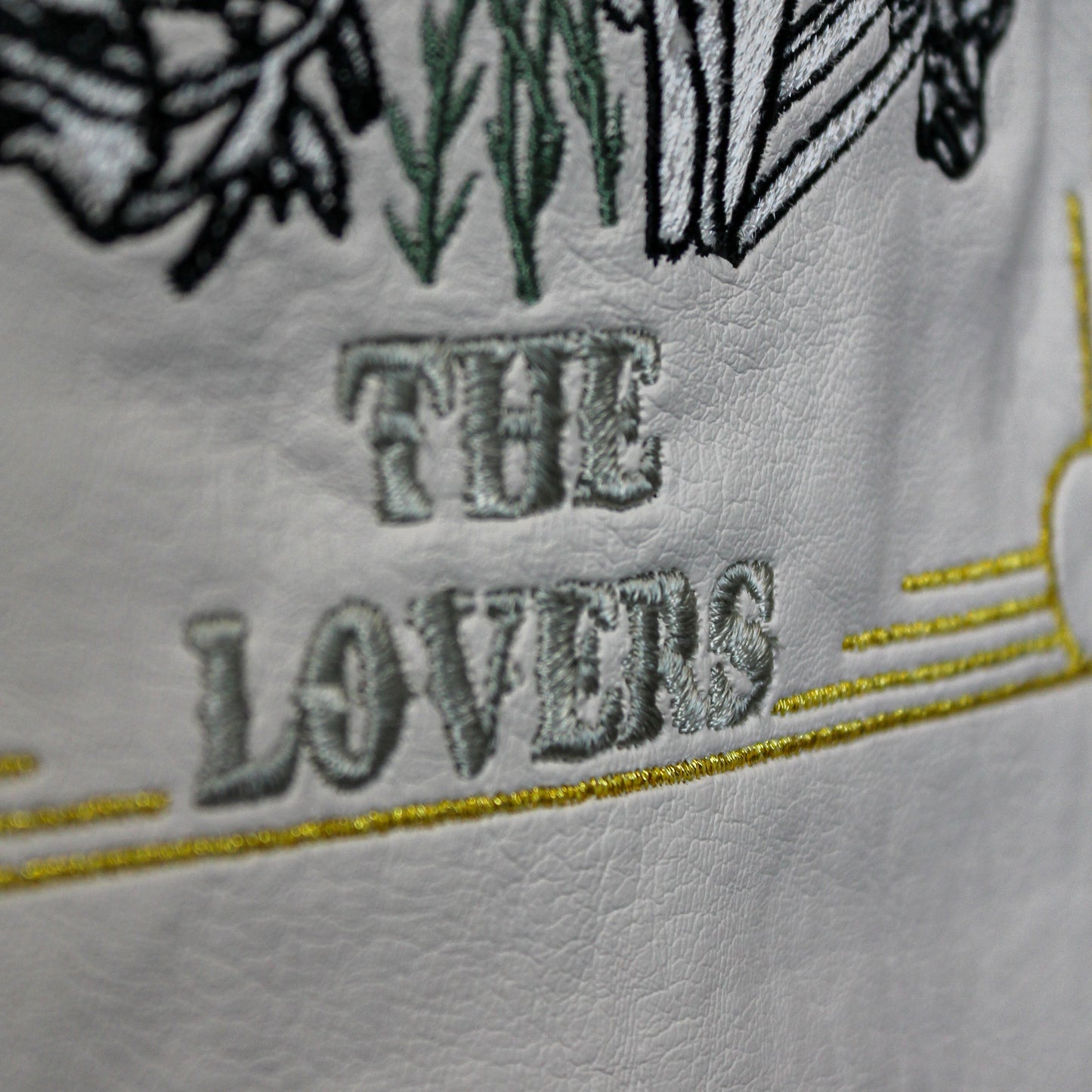 Cream leather jacket embellished with The Lovers Tarot Card, an elegant choice for brides