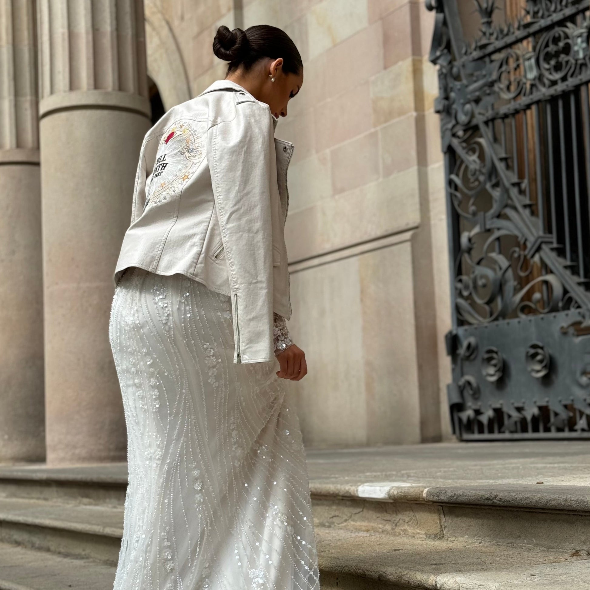 Bride wearing an Ivory Faux Leather Jacket on her Wedding Day in Barcelona