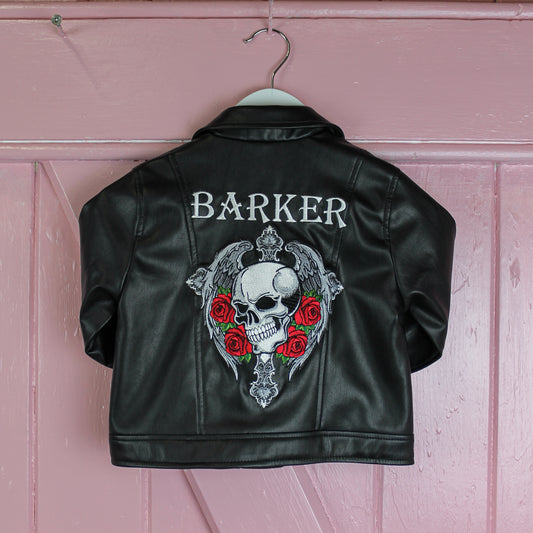Kid's custom black leather jacket with embroidered skull detail