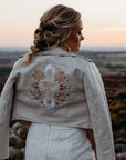 Ride or Die Bridal Cover Up: Make a bold statement on your wedding day with this ivory embroidered jacket, the perfect 'Ride or Die' accessory for a touch of edgy elegance