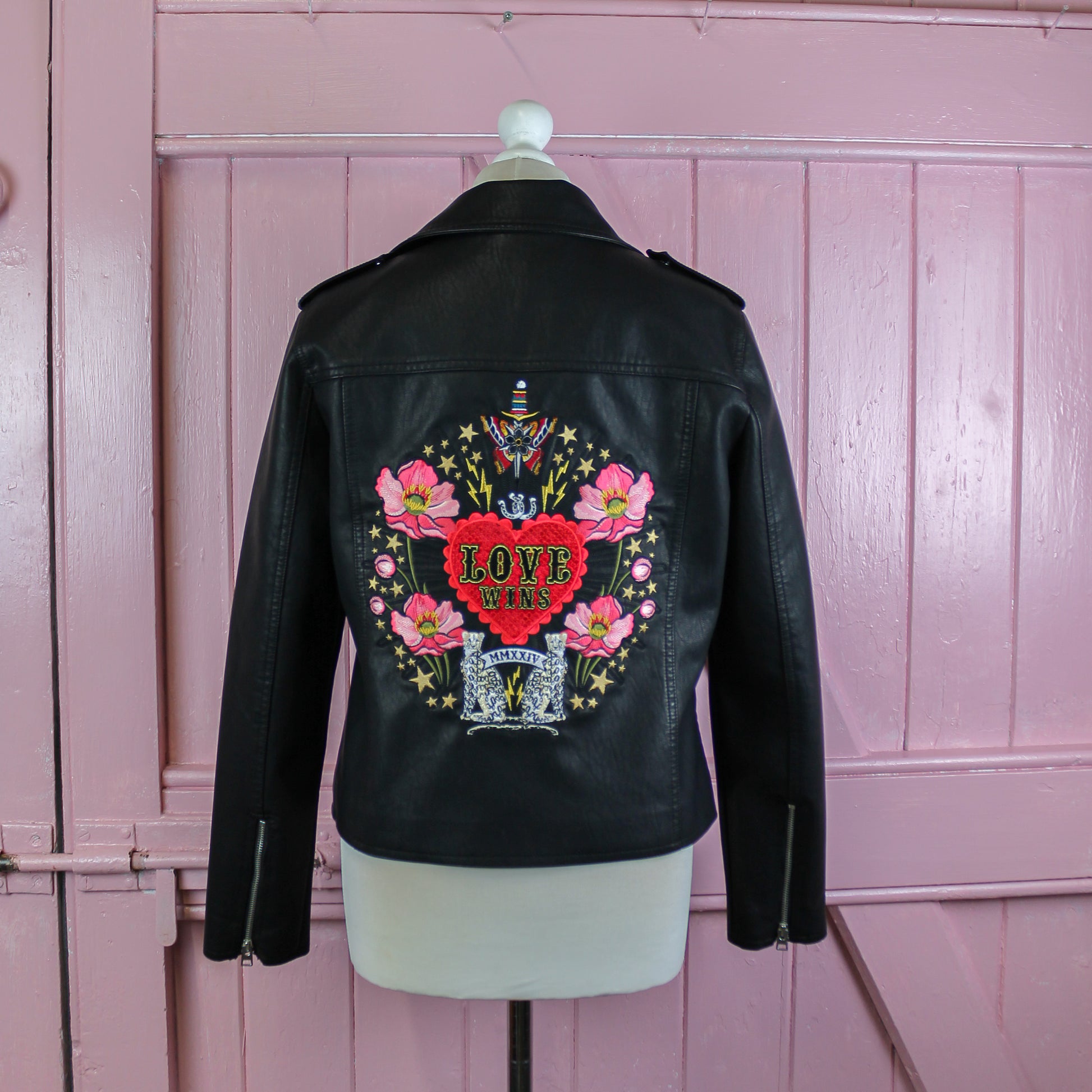 Custom black bridal jacket with personalized embroidery – Love Wins theme