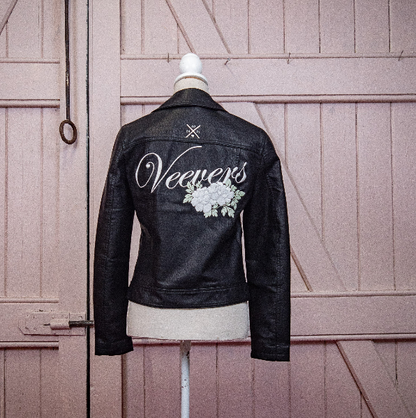 Surname Black Leather Bridal Jacket – a sleek and personalized cover-up for a modern and sophisticated wedding ensemble