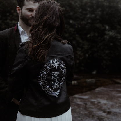 Black leather bridal jacket, featuring 'Come Hell or High Water' – a strong and stylish statement for your wedding