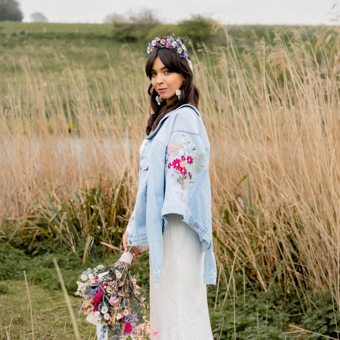Flower Bouquet Denim Bridal Cover Up: Elevate your wedding style with this chic ecru embroidered jacket, featuring a delightful flower bouquet design for a touch of romantic elegance