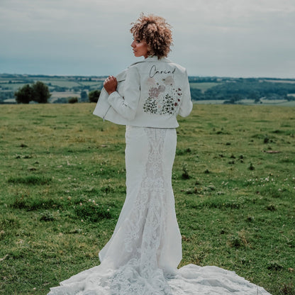 Wildflowers Bridal Cover Up: Elevate your wedding attire with this enchanting ecru embroidered jacket, adorned with delicate wildflowers for a touch of bohemian charm