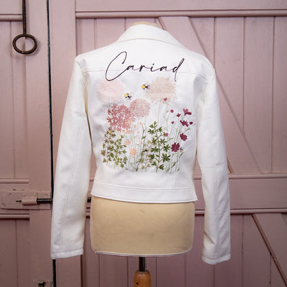 Ecru Embroidered Wildflowers Wedding Jacket: Embrace bohemian elegance with this stunning bridal cover-up, adorned with delicate wildflowers in beautiful embroidery